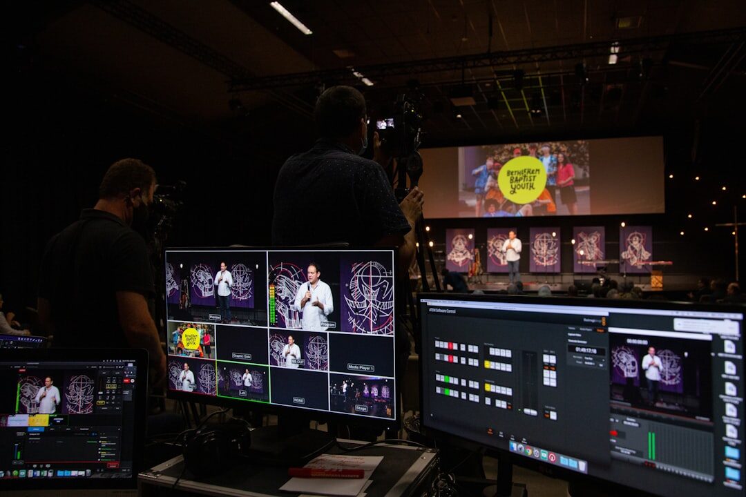 Broadcast control room with live monitors during a press conference